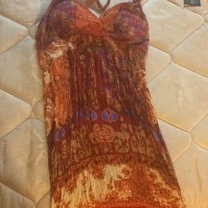 A colorful neck tie dress that’s a little backless